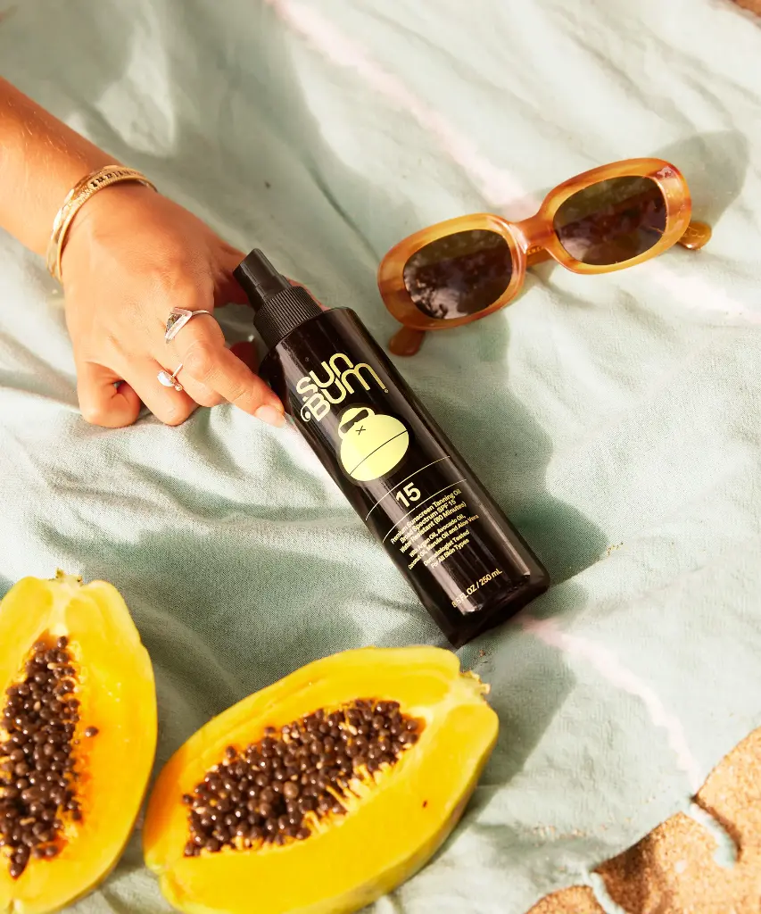 1_SPF15TanningOil_Lifestyle.webp